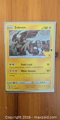 MaxSold Auction: Pokémon TCG Jumbo Lance's Charizard V Promo & Zekrom Holographic - Ottawa (Ontario, Canada) SELLER MANAGED Downsizing Online Auction - Regiment Avenue