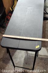 MaxSold Auction: 48in x 18in Black Plastic Folding Table with Metal Legs - Brighton (Ontario, Canada) SELLER MANAGED Estate Sale Online Auction - Drewery Street