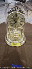 MaxSold Auction: Anniversary Style Gold Tone Quartz Clock with Glass Dome - Brighton (Ontario, Canada) SELLER MANAGED Estate Sale Online Auction - Drewery Street