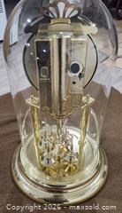 MaxSold Auction: Anniversary Style Gold Tone Quartz Clock with Glass Dome - Brighton (Ontario, Canada) SELLER MANAGED Estate Sale Online Auction - Drewery Street