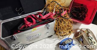 MaxSold Auction: Assorted Ratchet Straps, Bungee Cords, Cargo Net & Aluminum Case - Brighton (Ontario, Canada) SELLER MANAGED Estate Sale Online Auction - Drewery Street