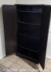 MaxSold Auction: Black Double-Door Storage Cabinet, 4 Adjustable Shelves - Brighton (Ontario, Canada) SELLER MANAGED Estate Sale Online Auction - Drewery Street