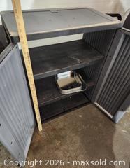 MaxSold Auction: Plastic/Resin Storage Cabinet with Double Doors, 2 Shelves, about 34 in - Brighton (Ontario, Canada) SELLER MANAGED Estate Sale Online Auction - Drewery Street