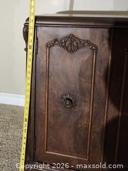 MaxSold Auction: Solid Wood Dark Brown Cabinet with Carved Details - Brighton (Ontario, Canada) SELLER MANAGED Estate Sale Online Auction - Drewery Street