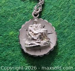 MaxSold Auction: Vintage NEW YORK WORLDS FAIR 1964 STERLING SILVER PIETA MEDAL CHARM  - East Cocalico Township (Pennsylvania, USA) SELLER MANAGED Downsizing Online Auction - Stevens Road