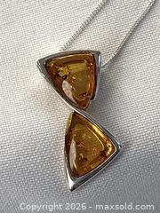 MaxSold Auction: 925 Sterling Silver BALTIC AMBER PENDANT   - Shelburne (Ontario, Canada) SELLER MANAGED Downsizing Online Auction - Main Street East