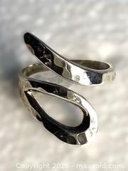 MaxSold Auction: 925 Sterling Silver HAMMERED WRAP AROUND RING Size 7 3/4 inches  - Shelburne (Ontario, Canada) SELLER MANAGED Downsizing Online Auction - Main Street East