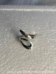 MaxSold Auction: 925 Sterling Silver HAMMERED WRAP AROUND RING Size 7 3/4 inches  - Shelburne (Ontario, Canada) SELLER MANAGED Downsizing Online Auction - Main Street East