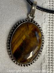 MaxSold Auction: 925 Sterling Silver TIGER EYE PENDANT Necklace     - Shelburne (Ontario, Canada) SELLER MANAGED Downsizing Online Auction - Main Street East