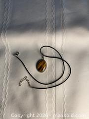 MaxSold Auction: 925 Sterling Silver TIGER EYE PENDANT Necklace     - Shelburne (Ontario, Canada) SELLER MANAGED Downsizing Online Auction - Main Street East