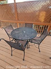 MaxSold Auction: Black Metal Patio Dining Set with Umbrella - Denver (Colorado, USA) SELLER MANAGED Estate Sale Online Auction - Greenwood Court