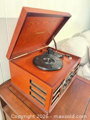 MaxSold Auction: Crosley Cherry Wood Multi-Format Turntable with Radio, CD, Cassette - Denver (Colorado, USA) SELLER MANAGED Estate Sale Online Auction - Greenwood Court