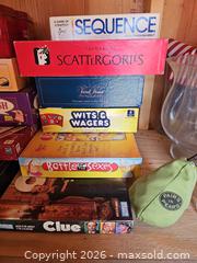 MaxSold Auction: Family Game Night! Boxed Board Game Collection plus Dominoes, and more! - Denver (Colorado, USA) SELLER MANAGED Estate Sale Online Auction - Greenwood Court