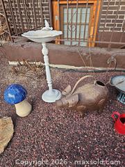 MaxSold Auction: Lot of 8 Garden Decor Items: Birdbaths, Watering Cans, Stakes - Denver (Colorado, USA) SELLER MANAGED Estate Sale Online Auction - Greenwood Court