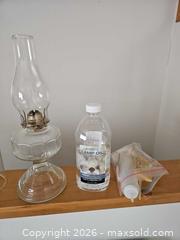 MaxSold Auction: Oil Lamp Trio, Starfish, and Vintage Oil Lamp, Oil and Brass Snuffer - Denver (Colorado, USA) SELLER MANAGED Estate Sale Online Auction - Greenwood Court