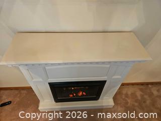 MaxSold Auction: White Electric Fireplace with Wood Mantel - Denver (Colorado, USA) SELLER MANAGED Estate Sale Online Auction - Greenwood Court