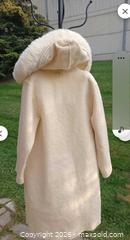 MaxSold Auction: Linda Lundstrom LaParka Women’s Hooded 100% Wool Knee-Length Coat, Cream, Size Medium - Burlington (Ontario, Canada) SELLER MANAGED Estate Sale Online Auction - Cloverleaf Drive