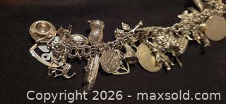 MaxSold Auction: Sterling Silver 32 Charm Bracelet, 7 in, Lobster Clasp - Burlington (Ontario, Canada) SELLER MANAGED Estate Sale Online Auction - Cloverleaf Drive