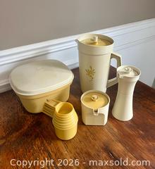 MaxSold Auction: Vintage Tupperware & Branded Plastic Measuring & Serving Set, ~5 pcs - Burlington (Ontario, Canada) SELLER MANAGED Estate Sale Online Auction - Cloverleaf Drive