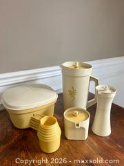 MaxSold Auction: Vintage Tupperware & Branded Plastic Measuring & Serving Set, ~5 pcs - Burlington (Ontario, Canada) SELLER MANAGED Estate Sale Online Auction - Cloverleaf Drive