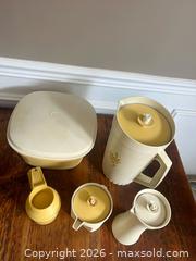 MaxSold Auction: Vintage Tupperware & Branded Plastic Measuring & Serving Set, ~5 pcs - Burlington (Ontario, Canada) SELLER MANAGED Estate Sale Online Auction - Cloverleaf Drive