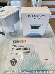 MaxSold Auction: Mixed Cookware Lot: Titanium Cutting Board, 2.3QT Casserole, Brita Water Pitcher - Arlington (Virginia, USA) SELLER MANAGED Downsizing Online Auction - 8th Street North