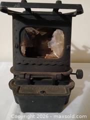 MaxSold Auction: Antique Cast Iron Sad Iron Stove – McClary Mfg. Co. with Two Flat Irons, sold as is - Kingston (Ontario, Canada) SELLER MANAGED Estate Sale Online Auction - Tamarac Street