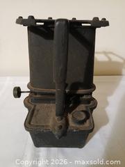 MaxSold Auction: Antique Cast Iron Sad Iron Stove – McClary Mfg. Co. with Two Flat Irons, sold as is - Kingston (Ontario, Canada) SELLER MANAGED Estate Sale Online Auction - Tamarac Street