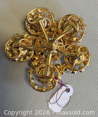 MaxSold Auction: (2) Vintage Singed TRIAD Rhinestone Brooches  - Toronto (Ontario, Canada) PARTNER MANAGED Reseller Online Auction - Queen Street West