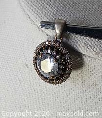 MaxSold Auction: Beautiful White Topaz with CZ on Sterling and Brass Pendant - Brantford (Ontario, Canada) SELLER MANAGED Reseller Online Auction - West Street (CONDO)