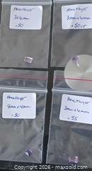 MaxSold Auction: Lot of 4 Amethyst Cut Gemstones for setting - Brantford (Ontario, Canada) SELLER MANAGED Reseller Online Auction - West Street (CONDO)