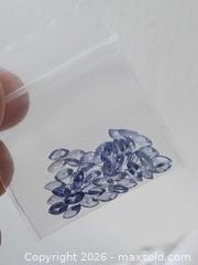 MaxSold Auction: Lot of Tanzanite Gemstones 49 pieces - Brantford (Ontario, Canada) SELLER MANAGED Reseller Online Auction - West Street (CONDO)