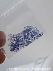 MaxSold Auction: Lot of Tanzanite Gemstones 49 pieces - Brantford (Ontario, Canada) SELLER MANAGED Reseller Online Auction - West Street (CONDO)