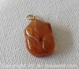 MaxSold Auction: Small Geniune Amber Pendant  - Brantford (Ontario, Canada) SELLER MANAGED Reseller Online Auction - West Street (CONDO)