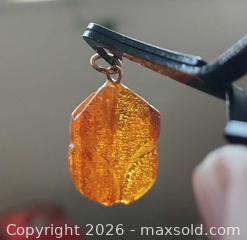 MaxSold Auction: Small Geniune Amber Pendant  - Brantford (Ontario, Canada) SELLER MANAGED Reseller Online Auction - West Street (CONDO)