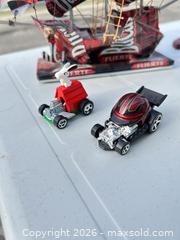 MaxSold Auction: Lot of 4–7 Novelty Collectible Items: Figurines, Toy Cars, Sign, Ship -EBN - Maple Ridge (British Columbia, Canada) PARTNER MANAGED Estate Sale Online Auction - 203 Street