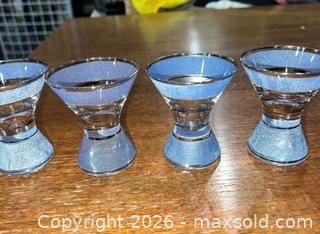MaxSold Auction: Mid-century Modern 4 blue/purple shimmery large decorative shot glasses  - Warwick Township (Pennsylvania, USA) SELLER MANAGED Estate Sale Online Auction -  Crocker Lane