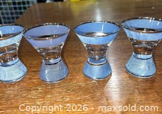 MaxSold Auction: Mid-century Modern 4 blue/purple shimmery large decorative shot glasses  - Warwick Township (Pennsylvania, USA) SELLER MANAGED Estate Sale Online Auction -  Crocker Lane