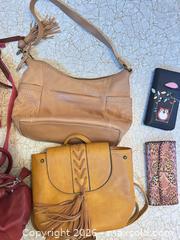 MaxSold Auction: Assorted leather & fabric handbags lot (4–6 pieces) - Calgary (Alberta, Canada) SELLER MANAGED Moving Online Auction - Varsville Place Northwest