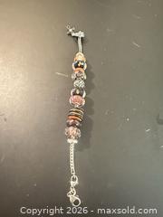 MaxSold Auction: Chamilia (CHAM visible) European Charm Bracelet, 7 in - Calgary (Alberta, Canada) SELLER MANAGED Moving Online Auction - Varsville Place Northwest