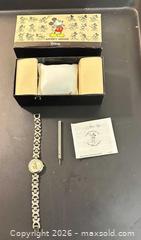 MaxSold Auction: Disney The Disney Store Mickey Mouse Silver-Tone Wrist Watch (1996) - Calgary (Alberta, Canada) SELLER MANAGED Moving Online Auction - Varsville Place Northwest