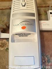 MaxSold Auction: Lux / Aerus Lux Classic Canister Vacuum, White - Calgary (Alberta, Canada) SELLER MANAGED Moving Online Auction - Varsville Place Northwest