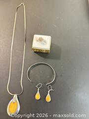 MaxSold Auction: Mixed Metal Amber Teardrop Pendant  .925 Sterling Silver Ring Jewelry Set with Box - Calgary (Alberta, Canada) SELLER MANAGED Moving Online Auction - Varsville Place Nw