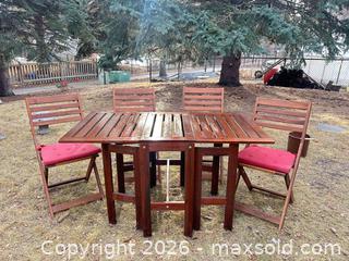 MaxSold Auction: Outdoor Patio Dining Set — Wood Table with 4 Folding Chairs - Calgary (Alberta, Canada) SELLER MANAGED Moving Online Auction - Varsville Place Nw