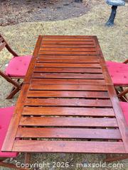 MaxSold Auction: Outdoor Patio Dining Set — Wood Table with 4 Folding Chairs - Calgary (Alberta, Canada) SELLER MANAGED Moving Online Auction - Varsville Place Nw