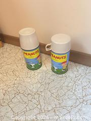 MaxSold Auction:  Peanuts Thermos , Plush Bug Bunny &  Paul McCartney Concert Black T-Shirt Large - Calgary (Alberta, Canada) SELLER MANAGED Moving Online Auction - Varsville Place Nw