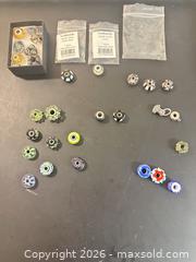 MaxSold Auction: Trollbeads Mixed Glass & Spacer Bead Lot — 15+ Pieces - Calgary (Alberta, Canada) SELLER MANAGED Moving Online Auction - Varsville Place Northwest