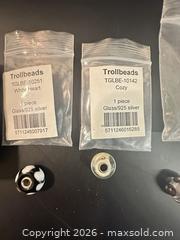 MaxSold Auction: Trollbeads Mixed Glass & Spacer Bead Lot — 15+ Pieces - Calgary (Alberta, Canada) SELLER MANAGED Moving Online Auction - Varsville Place Northwest