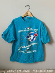 MaxSold Auction: VINTAGE 1993 MLB TORONTO BLUE JAYS T-Shirt  - Toronto (Ontario, Canada) SELLER MANAGED Estate Sale Online Auction - Magnetic Drive