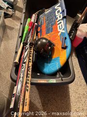 MaxSold Auction: Assorted Hockey Sticks, Baseball Bats & Bodyboard - Toronto (Ontario, Canada) SELLER MANAGED Downsizing Online Auction - Joicey Boulevard